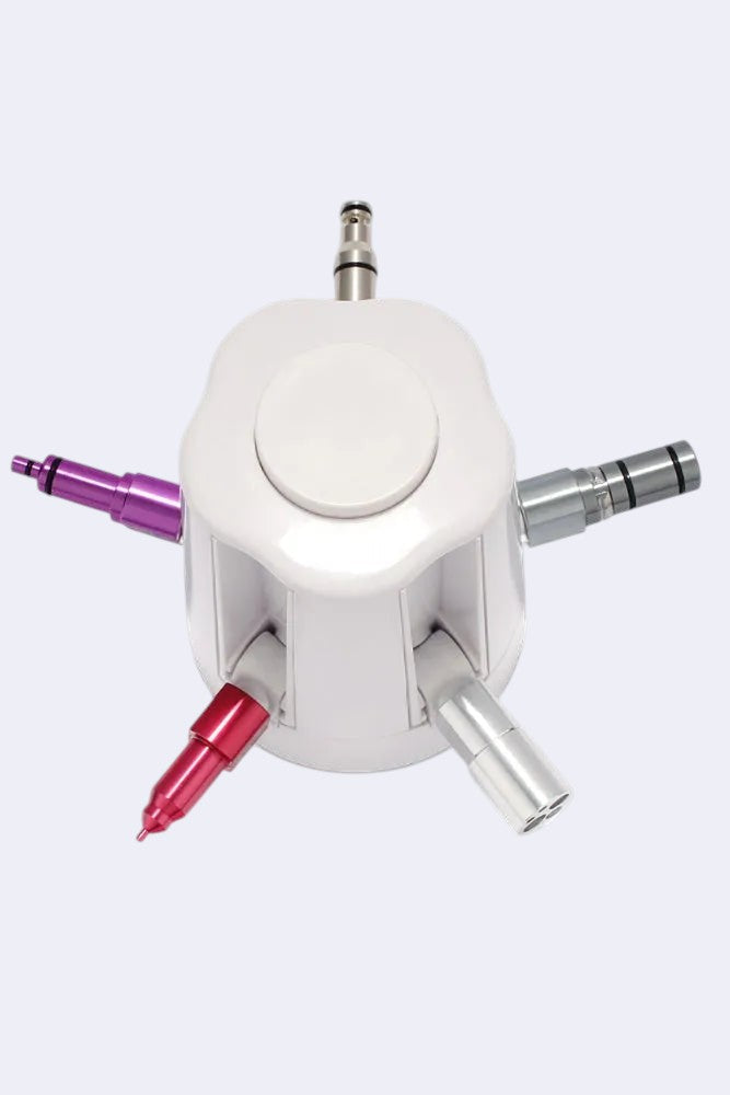 DENTISTOOLBOX multi-lubrication tip system with metal inserts and rubber seals for dental instruments.