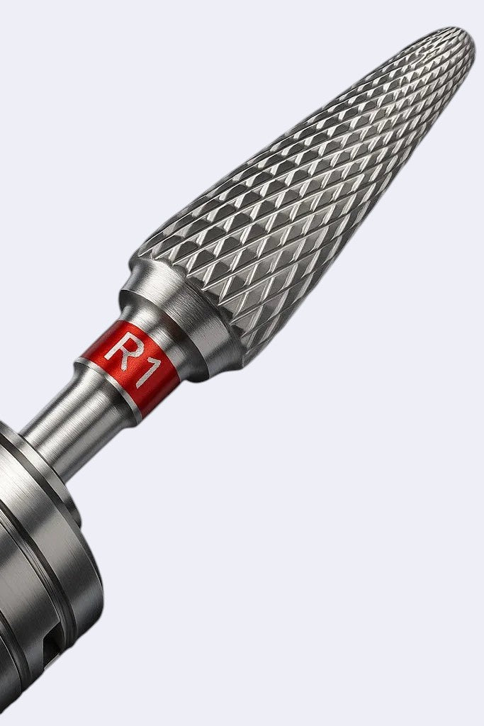 DENTISTOOLBOX tungsten carbide dental bur with red R1 marking for resin polishing and finishing.